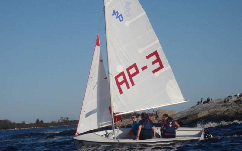 A photo of a sailing club vessel going past Avery Point